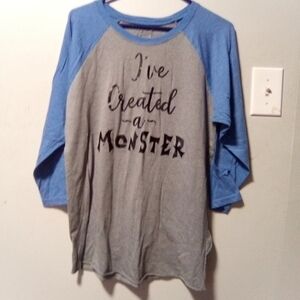 BASEBALL shirt. Blue and gray. Size large. "I've created a monster on front"